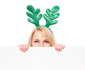 Image showing Christmas woman showing empty blank