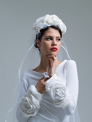 Image showing young bride in a wedding dress with a veil