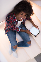 Image showing black woman using her electronic tablet