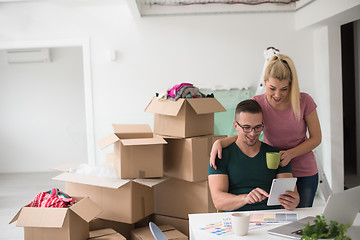 Image showing Young couple moving in a new home