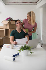 Image showing Young couple moving in a new home