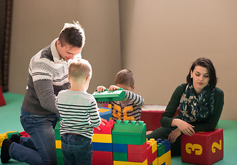 Image showing parents having fun with kids