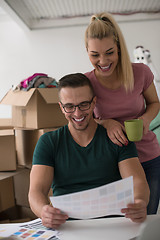 Image showing Young couple moving in a new home