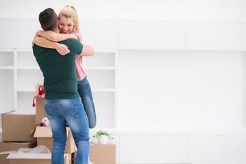 Image showing happy Young couple moving in new house