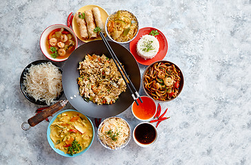 Image showing Asian oriental food composition in colorful dishware