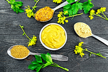 Image showing Mustard different in bowl and spoons on board top