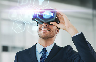 Image showing businessman with virtual reality headset at office