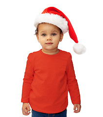 Image showing baby girl in santa hat over white background