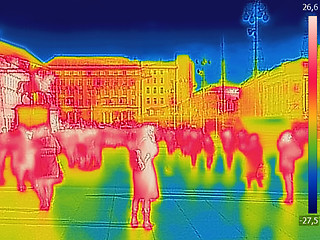 Image showing Infrared Thermal image of people walking the city streets on a c
