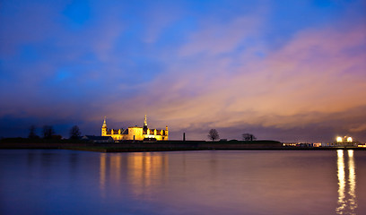 Image showing Kronborg Castle at night seen from Elsinore harbour