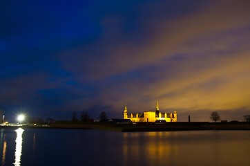 Image showing Kronborg Castle at night seen from Elsinore harbour