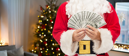 Image showing close up of santa claus with dollar money