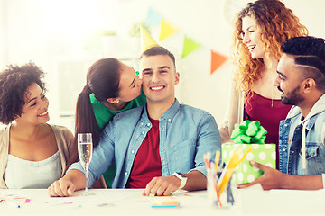 Image showing team greeting colleague at office birthday party