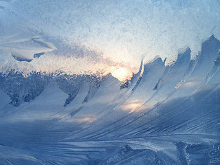 Image showing Beautiful ice pattern and sunlight on glass