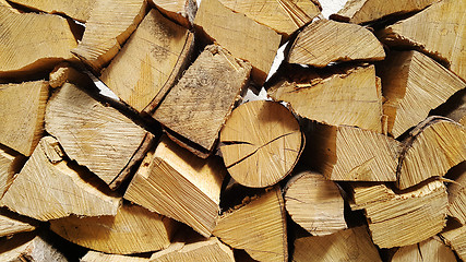 Image showing Firewood pile stacked chopped wood trunks