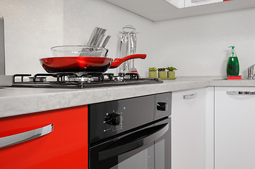 Image showing Modern red and white kitchen interior