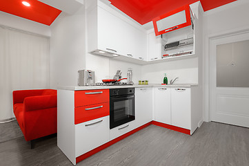 Image showing Modern red and white kitchen interior