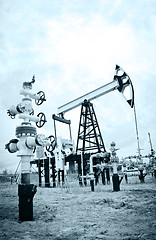 Image showing Pump jack and oilwell.