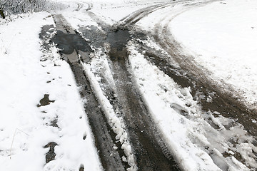 Image showing traces of the car on snow