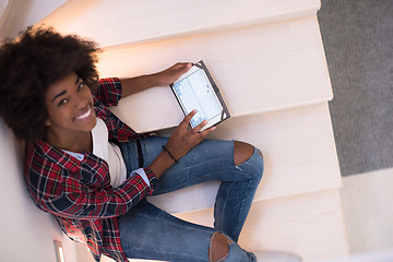 Image showing black woman using her electronic tablet