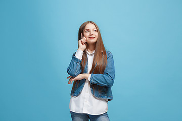 Image showing Young serious thoughtful teen girl. Doubt concept.