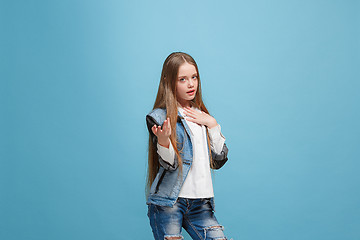 Image showing Young serious thoughtful teen girl. Doubt concept.