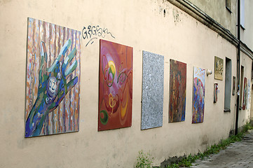 Image showing LITHUANIA, VILNIUS - AUGUST 14, 2014 - Paintings on a street wall in Uzupis