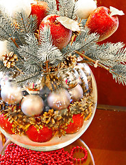Image showing Christmas holidays composition with red apples, silver balls, andglass vase