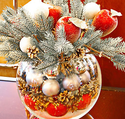 Image showing Christmas holidays composition with red apples, silver balls, andglass vase