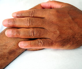 Image showing African american hands resting.