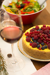 Image showing close up of cake and other food on christmas table