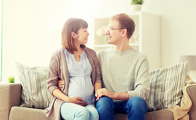 Image showing happy pregnant wife with husband at home