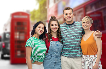 Image showing happy friends over london city street background