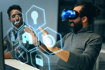 Image showing man in vr headset with virtual interface at office