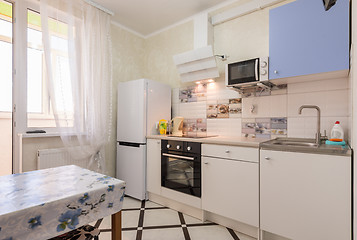 Image showing The interior of a small kitchen in the apartment