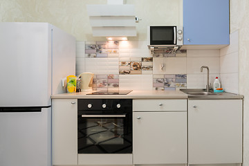 Image showing The interior of a compact kitchen in the apartment house