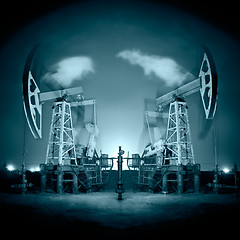 Image showing Oil Rigs at night.