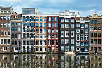 Image showing Amsterdam canal Damrak with houses, Netherlands