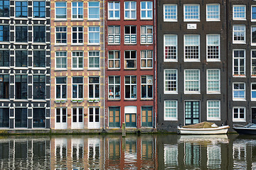 Image showing Amsterdam canal Damrak with houses, Netherlands