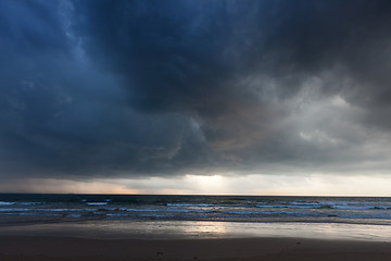Image showing Gathering storm on beach