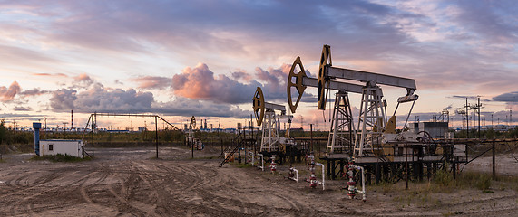 Image showing Panoramic oil pumpjack.