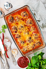 Image showing baked meatballs with sauce