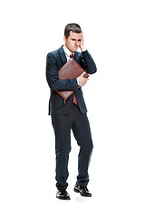 Image showing Full body portrait of businessman with folder on white