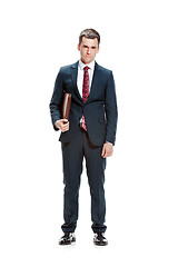 Image showing Full body portrait of businessman with folder on white