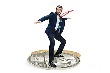 Image showing The business man standing on business icon