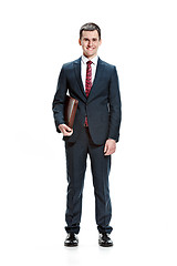 Image showing Full body portrait of businessman with folder on white