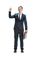 Image showing Full body portrait of businessman with folder on white