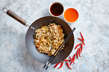 Image showing Delicious fried rice with chicken in wok