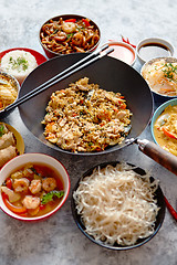 Image showing Asian oriental food composition in colorful dishware