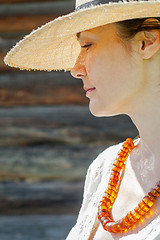 Image showing woman with an amber necklace